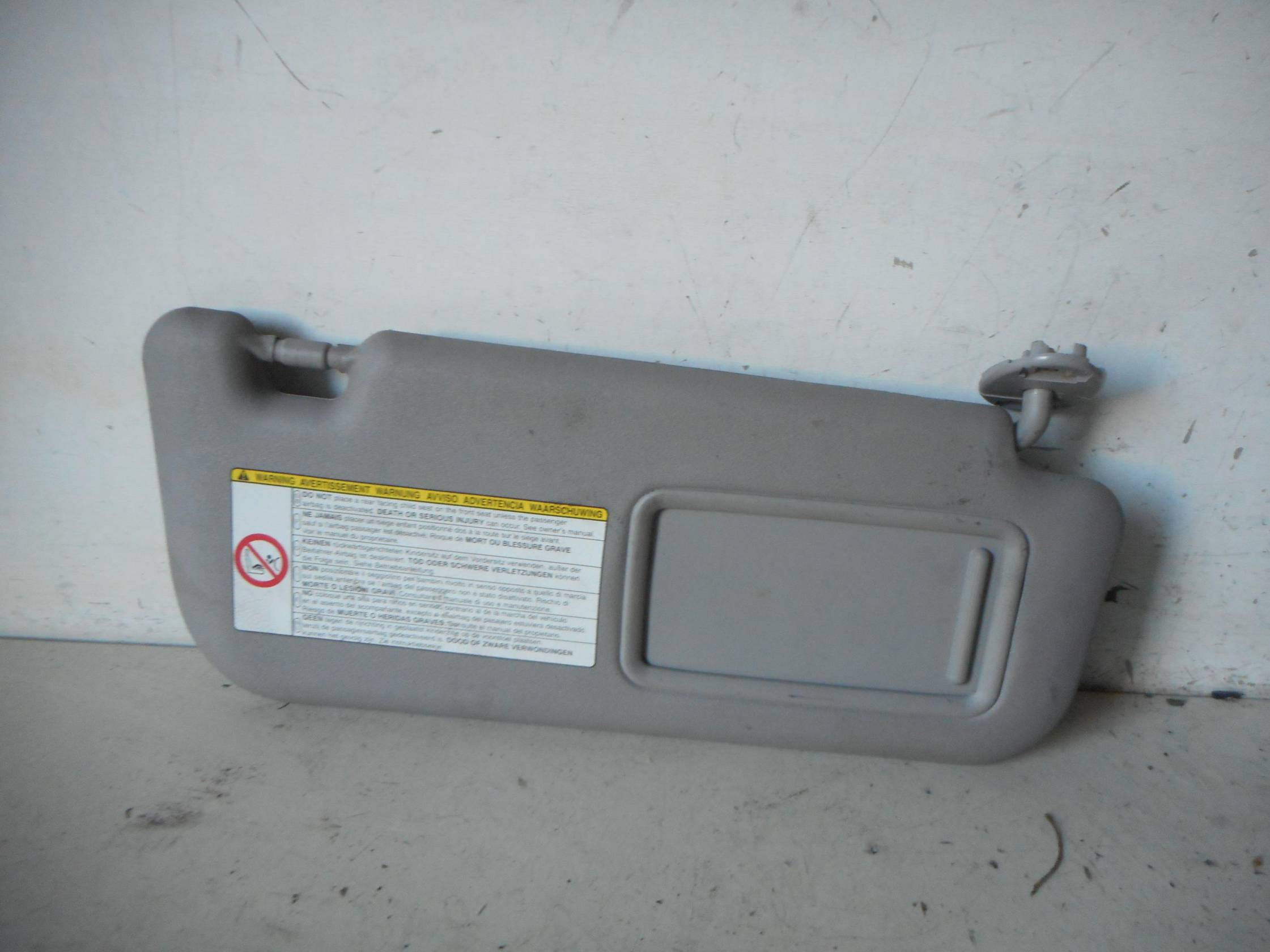 Aletta parasole parabrezza dx.